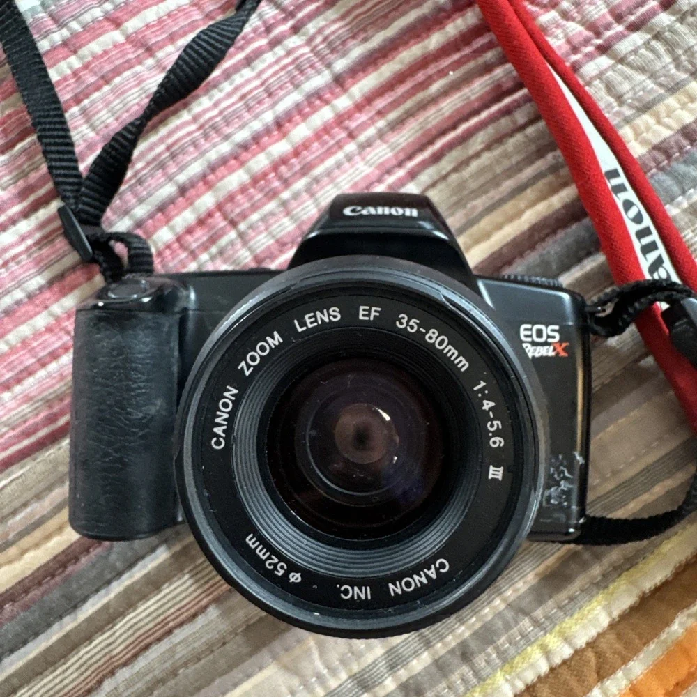 Canon EOS Rebel X 35mm SLR 35-80mm Lens Neck strap Lense Cover Not Tested READ